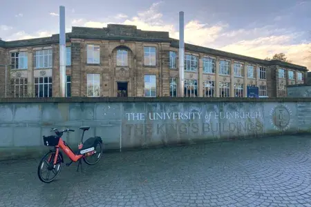 pink voi bike outside King's Buildings